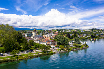 Fototapeta na wymiar Aerial view of Morges city waterfront in the border of the Leman Lake in Switzerland