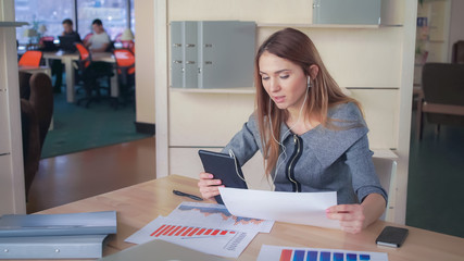 Busy woman try to save time hold the meeting via internet. She discuss with partner plans and profit
