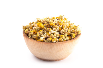 Bowl of Dried Chamomile Flowers Isolated on a White Background