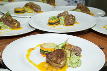 serving of grilled meat served on the table