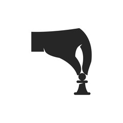 Hand holding chess pawn icon in black and white. Vector illustration.