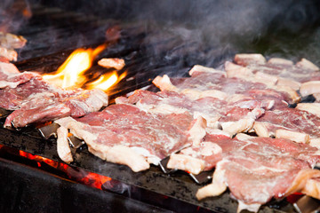Grilled beef steak on the flaming grill, Selective focus