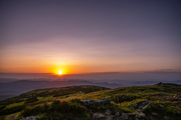 Sunrise in the summer in the mountains