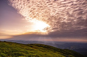 Sunrise in the summer in the mountains