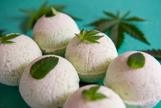 Cannabis Bath Bombs With Marijuana And Mint Leaves