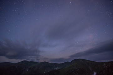 Fototapeta na wymiar Starry sky at night over the mountains in the Carpathians