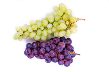 green and wine grapes on white background