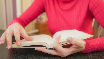 Girl reading a book, static