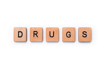 The word DRUGS