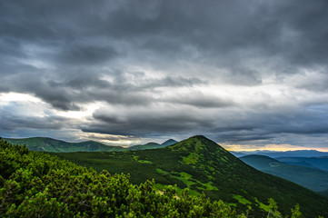 Rain clouds in the evening over the mountains