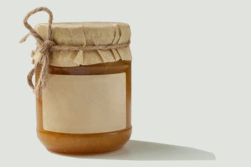 Jar of jam with blank label isolated