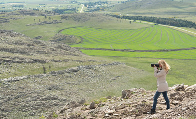 Woman with dslr camera