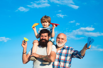 Men generation. Generation of people and stages of growing up. Father and son enjoying outdoor....