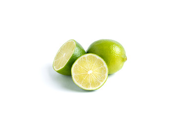 Lime whole and half isolated on white background