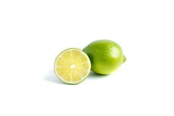 Lime whole and half isolated on white background
