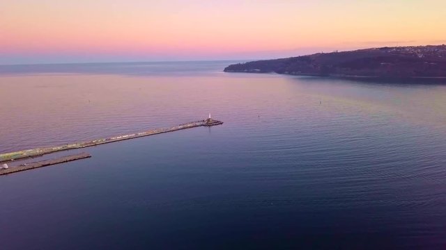 Dusk over Varna breakwater harbour