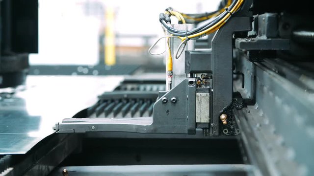 Automated metal feed line for processing on stamping press. High-tech equipment