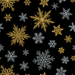 Fototapeta na wymiar Christmas seamless pattern of complex small snowflakes in gray and yellow colors on black background