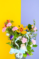 Bouquet of flowers on bright background. 