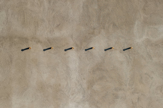 concrete wall with hooks