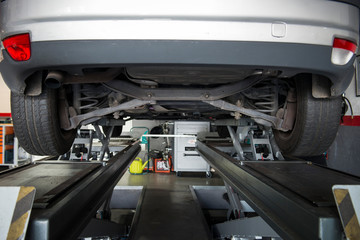 view of the underside of a car in the garage