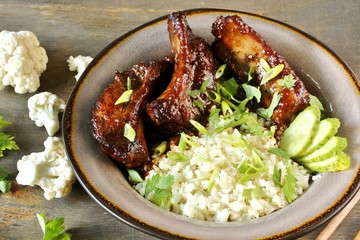 short ribs Asian with cauliflower rice. keto diet recipe. low carbohydrate meal