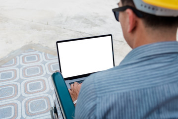 Middle-age Asian person work at home architect house building outdoor.