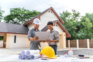 Two business man professional engineer worker at the house building.