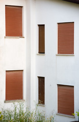 Treviso, Italy, 06/23/2019, Windows on old farmhouse in Treviso prefecture in Italy.