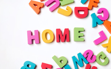 Obraz premium Isolated ' HOME ' Colorful Wooden Letters and Word, Learning English Word and Meaning 