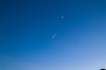 Moon and Shooting star over mountain lakes