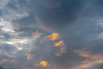 The cloudscape photo after the sunset with two tones of clouds in the evening after the rain. 