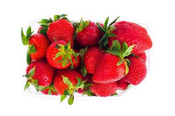Fresh sweet red strawberries in plastic container. 