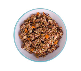 Red rice porridge with meat and vegetables.