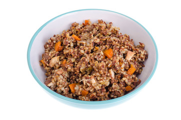 Red rice porridge with meat and vegetables.