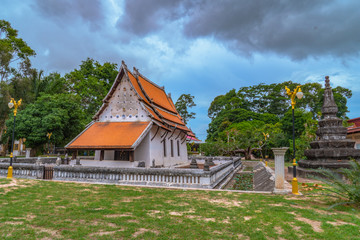 white cloud in blue sky above the old church of wat Ban Lang temple in Rayong province Thailand. the old church was built in Ayutthaya period