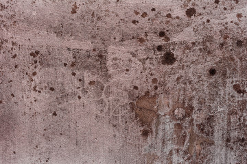 Texture of a concrete wall with cracks and scratches which can be used as a background