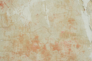 Texture of a concrete wall with cracks and scratches which can be used as a background