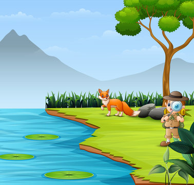 The explorer boy in the river with a fox
