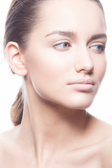 Beauty young model woman with healthy perfect skin studio portrait. White background. Skincare facial treatment concept