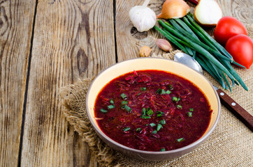 Veggie vegetable soup with red beet.