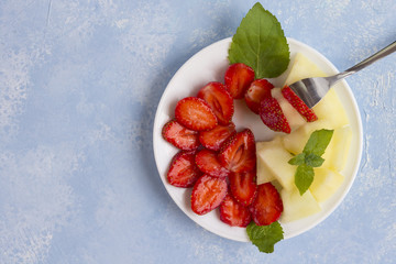 Fresh Organic Vegetarian Fruit Salad on a plate.