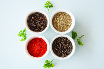 Variety of ground spices herbs. Top view.