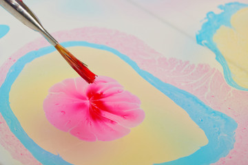 Ebru - The art of painting on the water. Process of creating drawings in ebru technique.