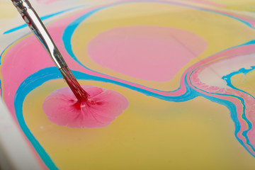 Ebru - The art of painting on the water. Process of creating drawings in ebru technique.