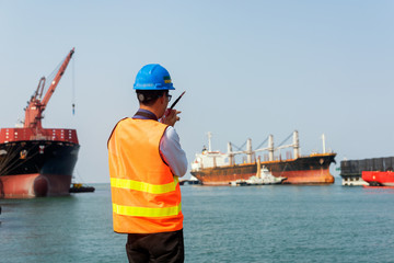 engineering foreman, supervisor, master controller in working place, command working area for...