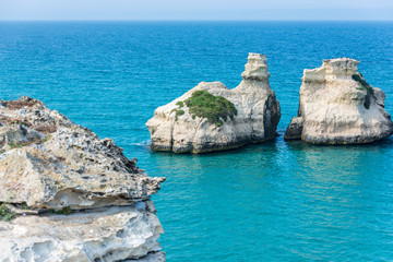 Dreamlike Salento. Bay of Torre dell'Orso and stacks of the two sisters. Puglia, Italy