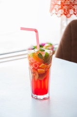 Fresh fruit lemonade with mint in a glass