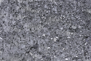 Plakat Grunge concrete wall with crushed stone. Gray concrete texture. Natural stone background