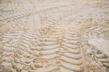 Wheel track on the sand.